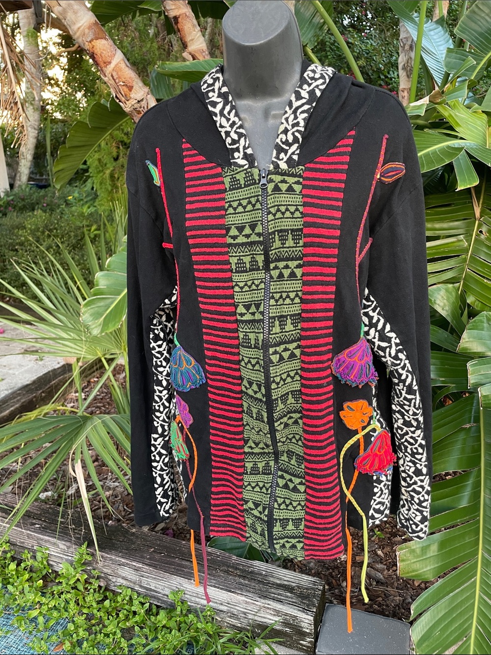 Kathmandu style card, floral and fringe hooded jacket